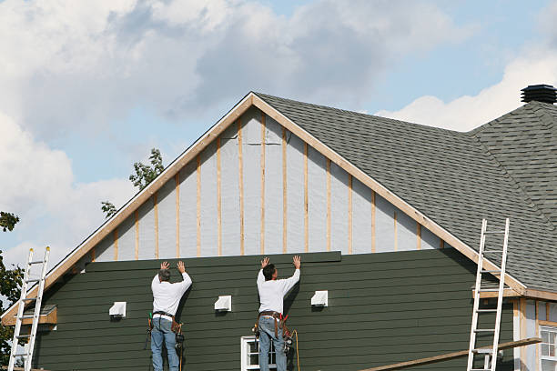 Professional Siding technician working in Stedman, NC